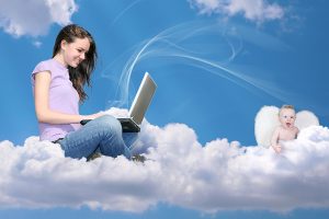 bigstock_girl_with_notebook_on_cloud_an_12990362